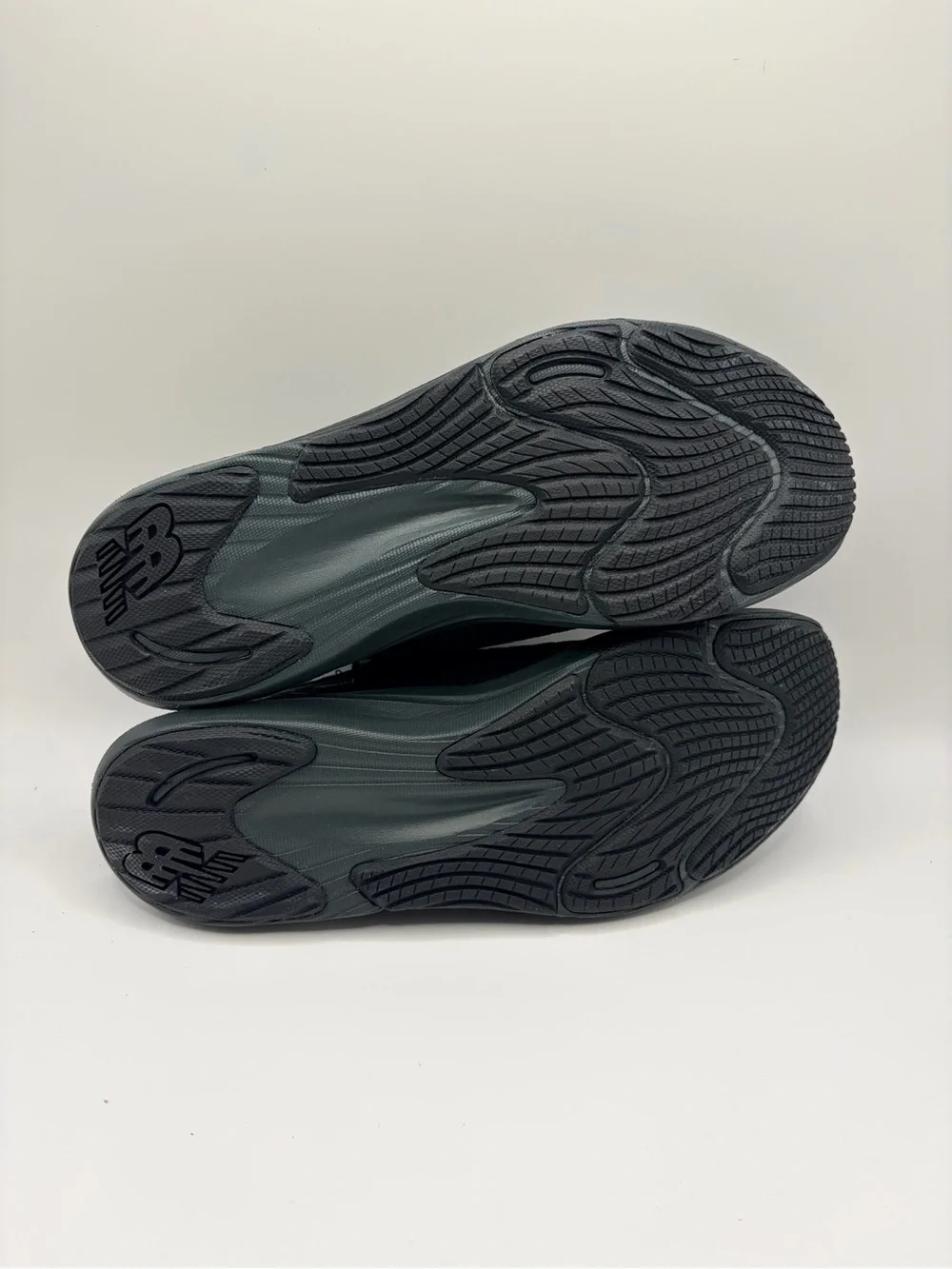 New Balance Women’s Black Knit Slip-On Sneakers with Dark Gray Sole
